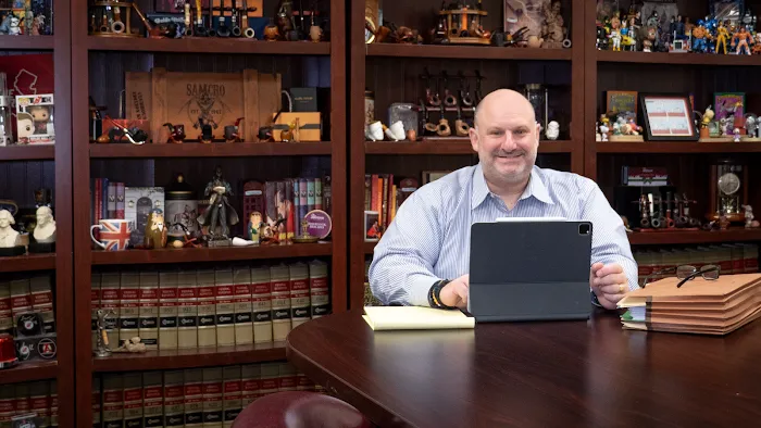 Law Offices of Peter J. Lamont 4
