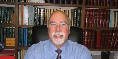 Warren Brumel, Esq.