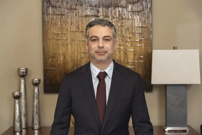 Law Office of Carlos L. Corless 4