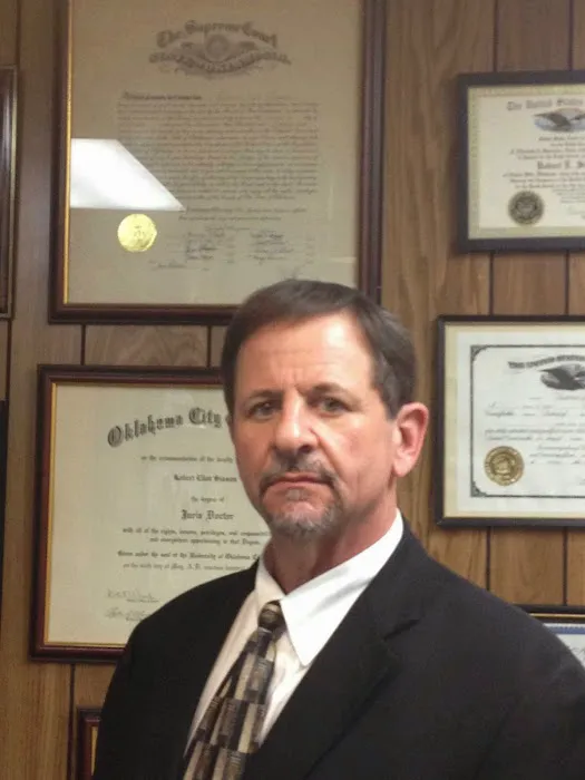 Robert Eliot Sisson P.L.L.C. Attorney at Law 5