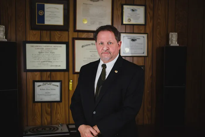 Robert Eliot Sisson P.L.L.C. Attorney at Law 5